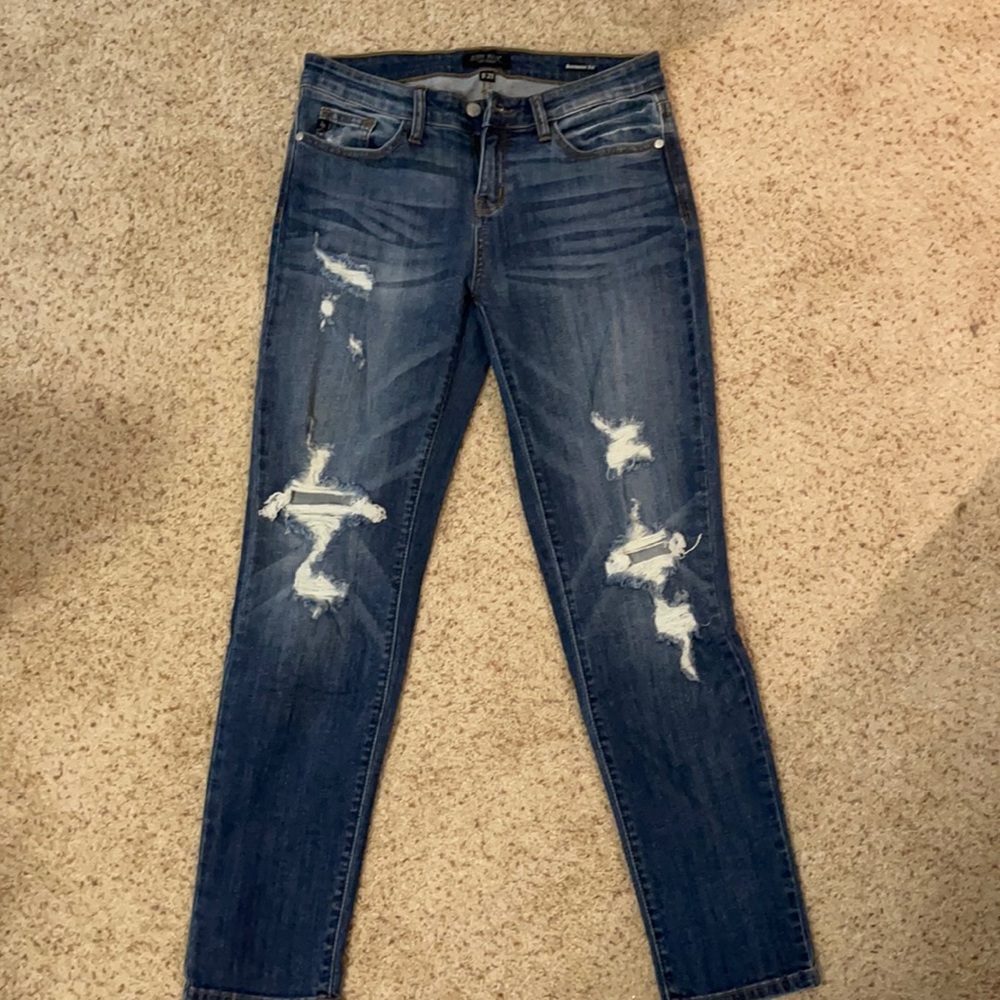 Never worn distressed denim
